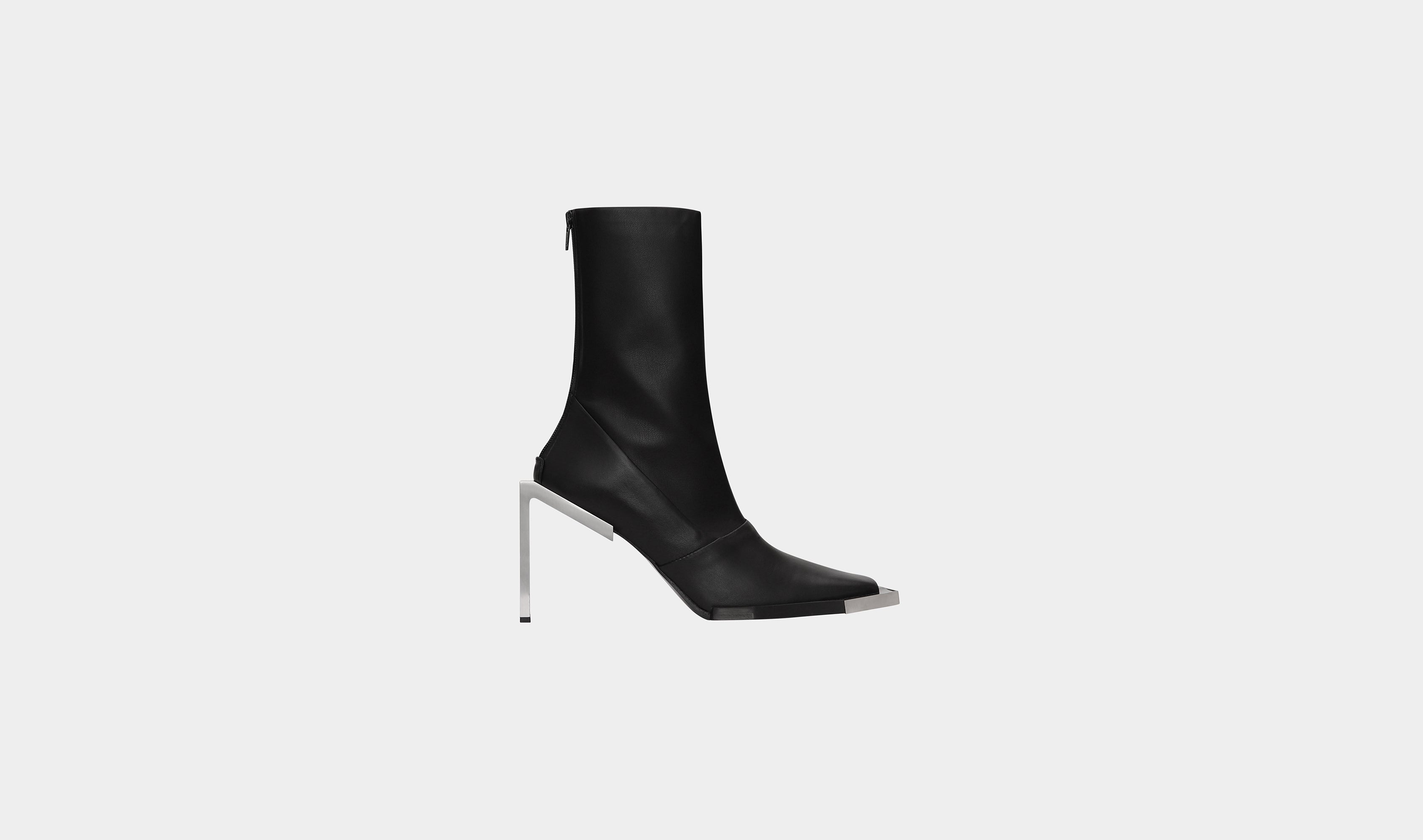 HE, product: ANKLE-HIGH BOOTS (Fig. 1)