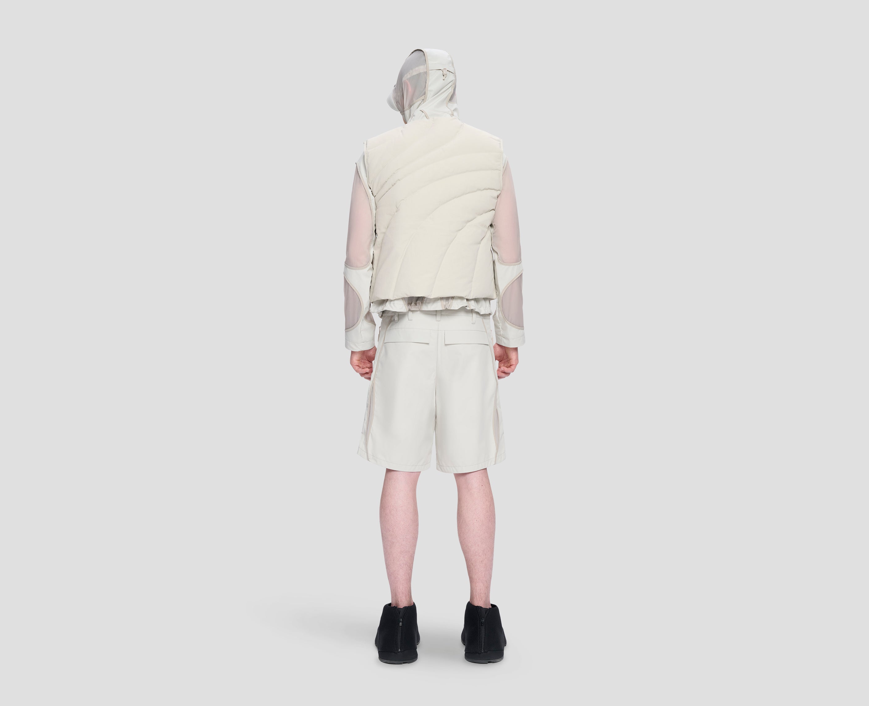 HE, product: LAYERED DOWN VEST (Fig. 6)