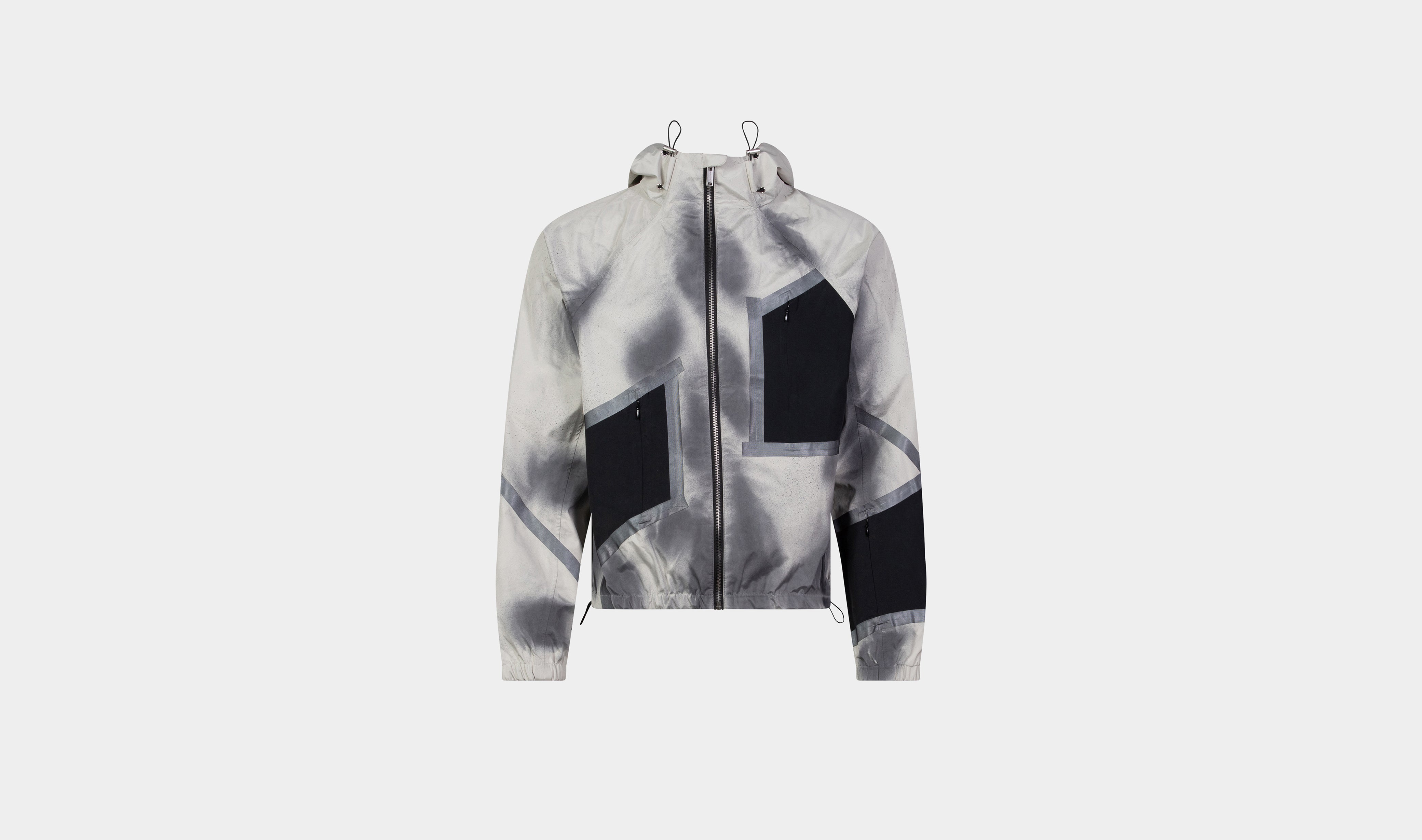 HE, product: EXUVIA WINDBREAKER (Fig. 1)