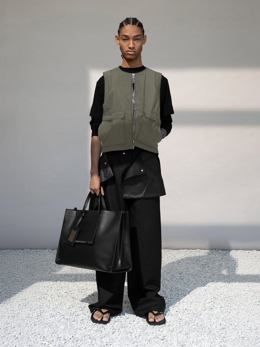 HE, product: MOTILITY VEST (Fig. 6)