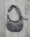 HE, product: LIQUID METAL ATTACHE TOTE (Fig. 14)