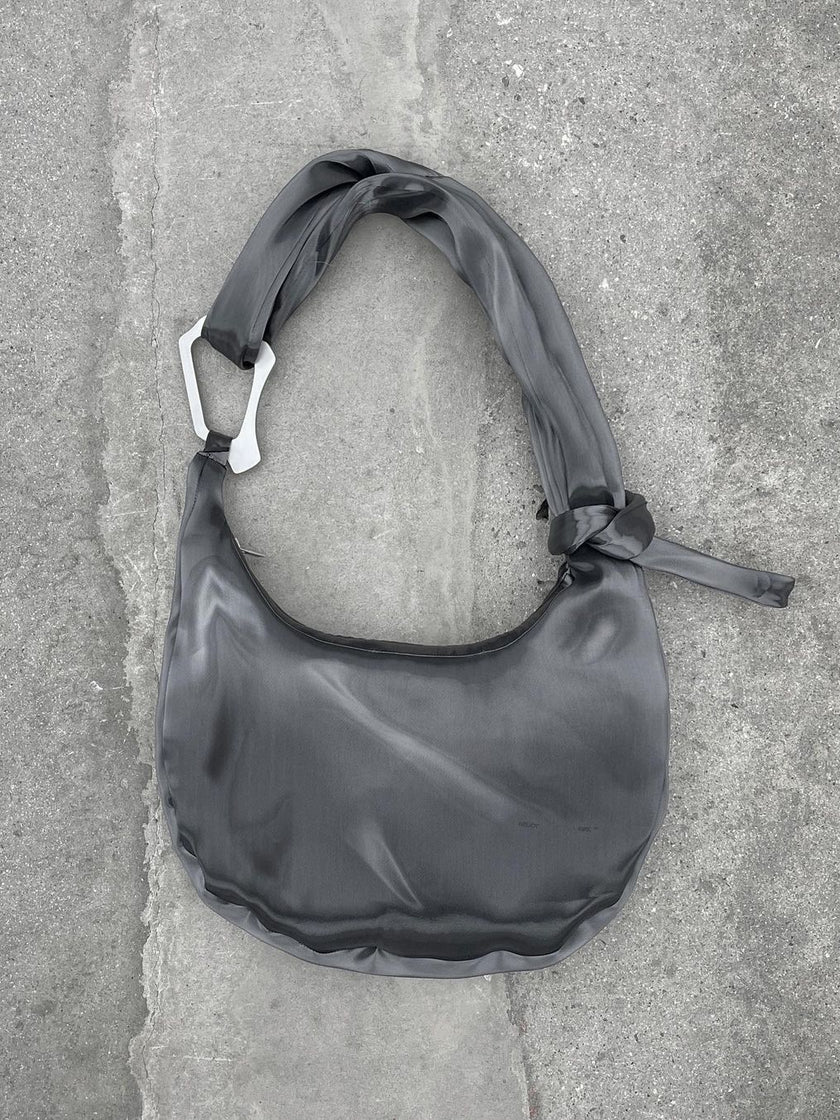 HE, product: LIQUID METAL ATTACHE TOTE (Fig. 14)