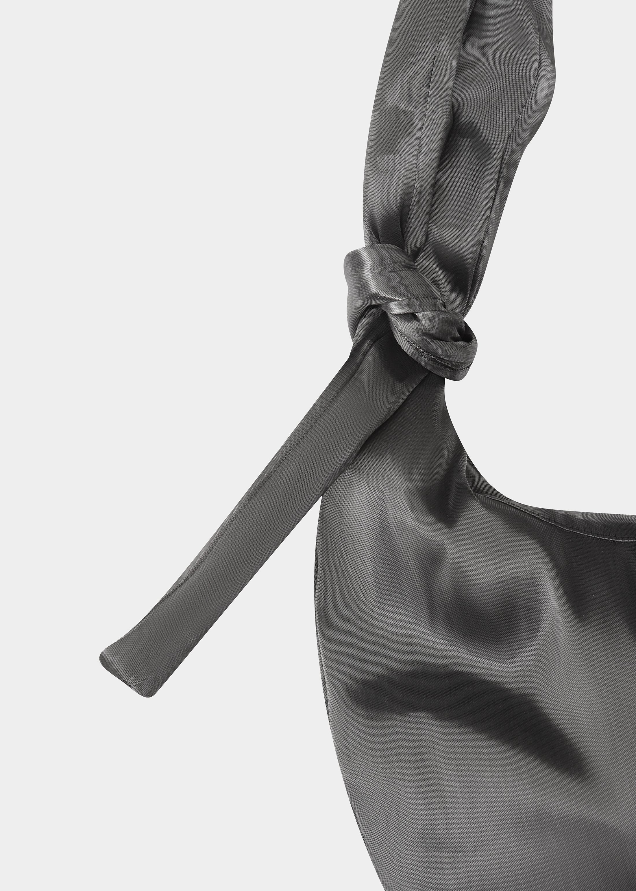 HE, product: LIQUID METAL ATTACHE TOTE (Fig. 11)