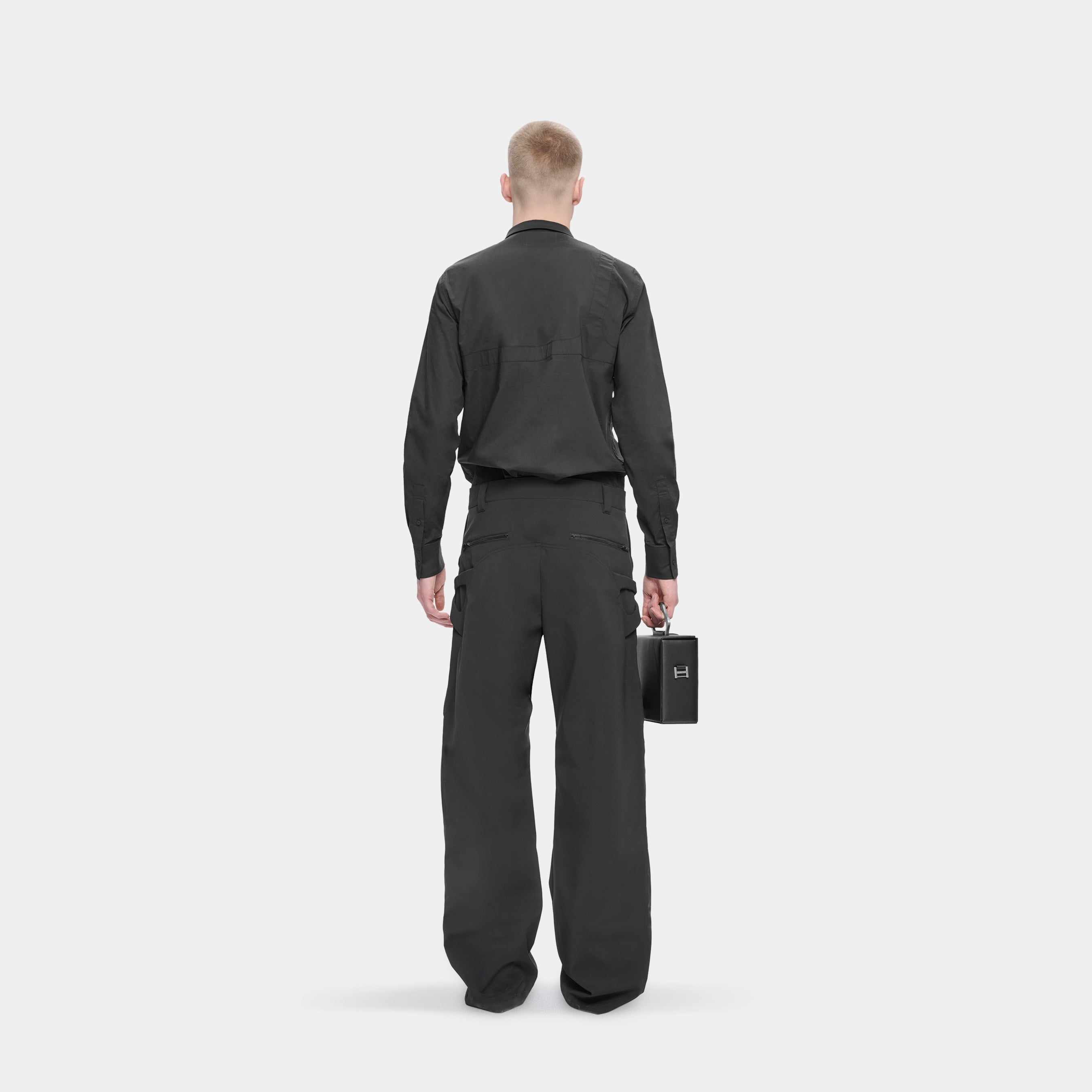 HE, product: TACK TROUSERS (Fig. 4)