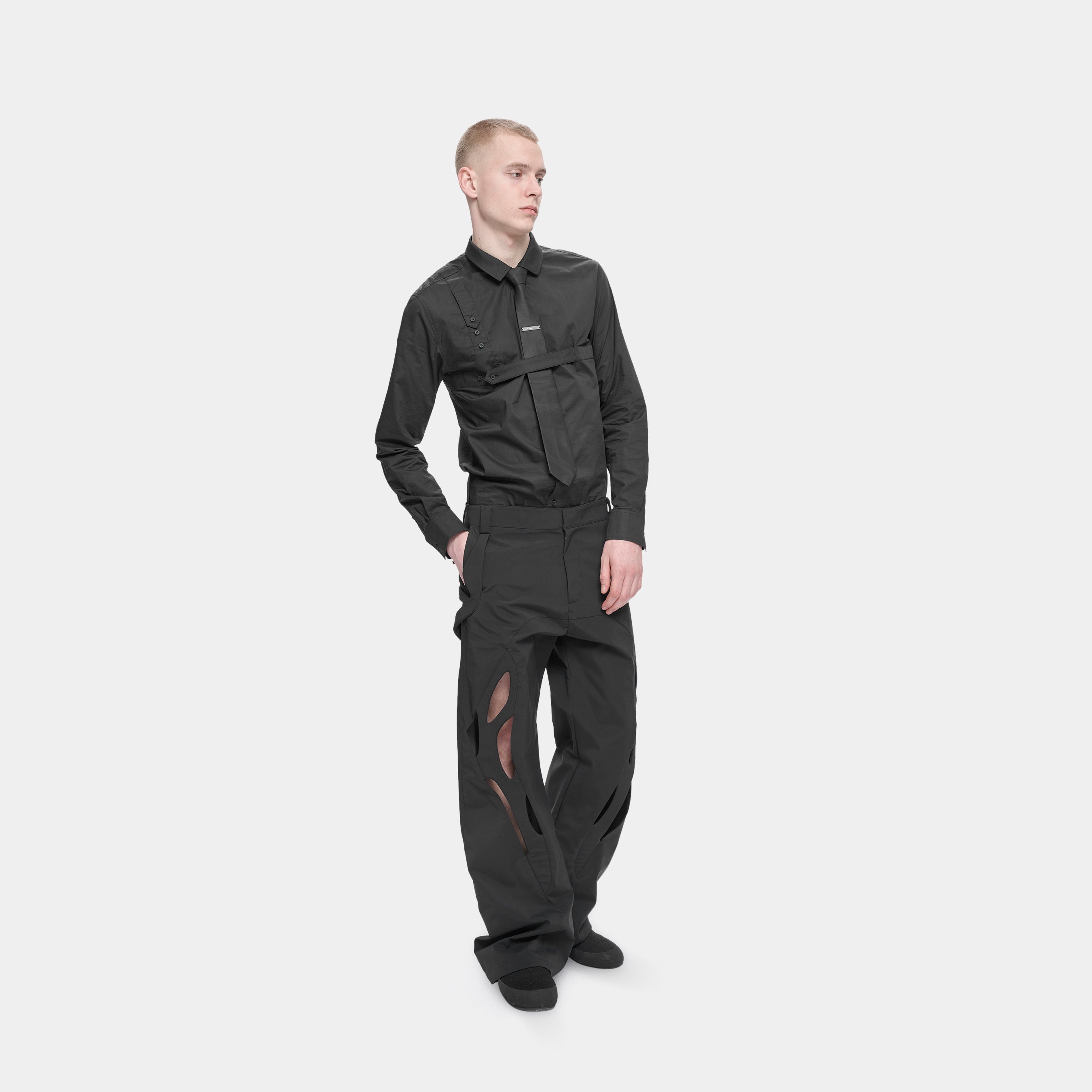 HE, product: TACK TROUSERS (Fig. 3)
