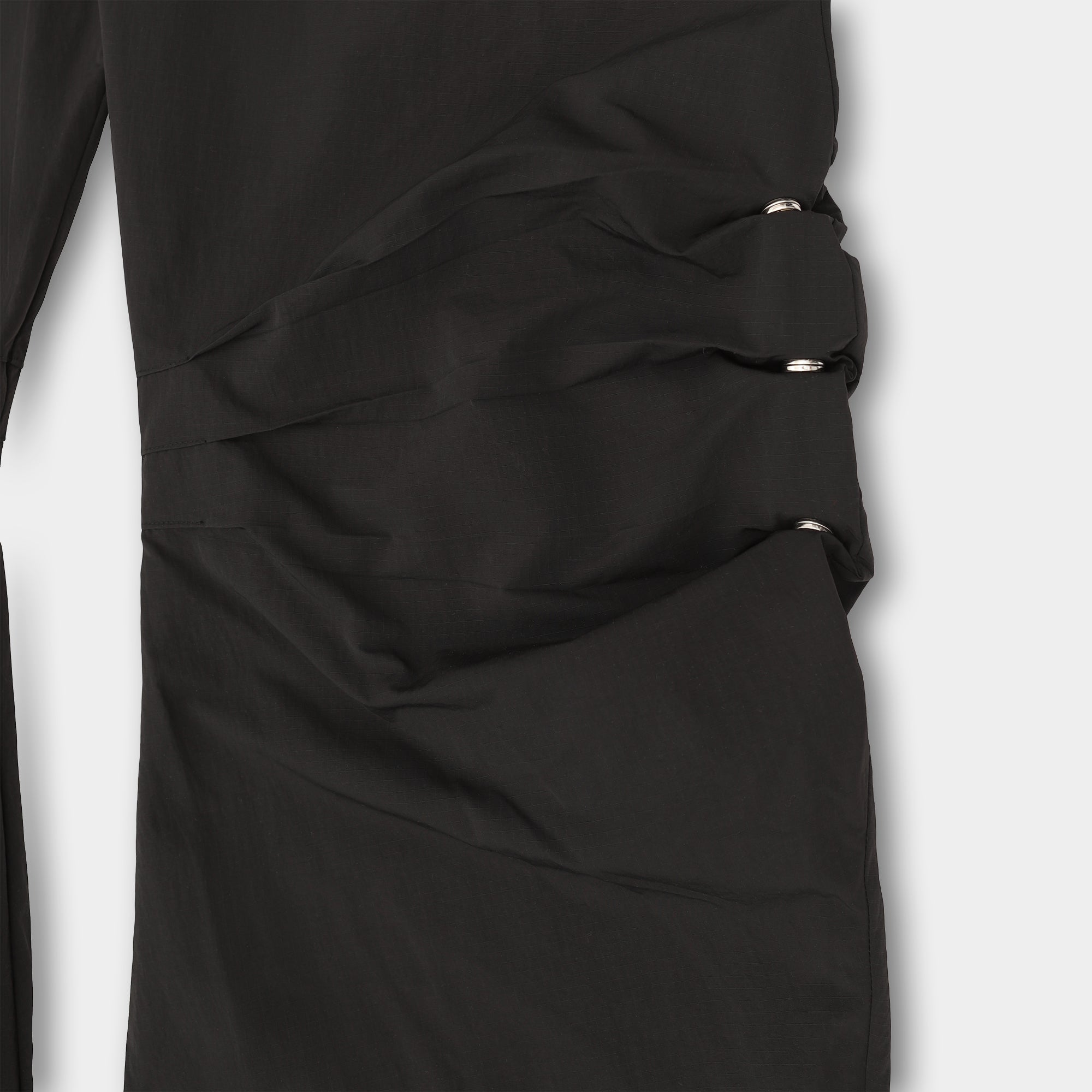 HE, product: FERRO TROUSERS (Fig. 10)