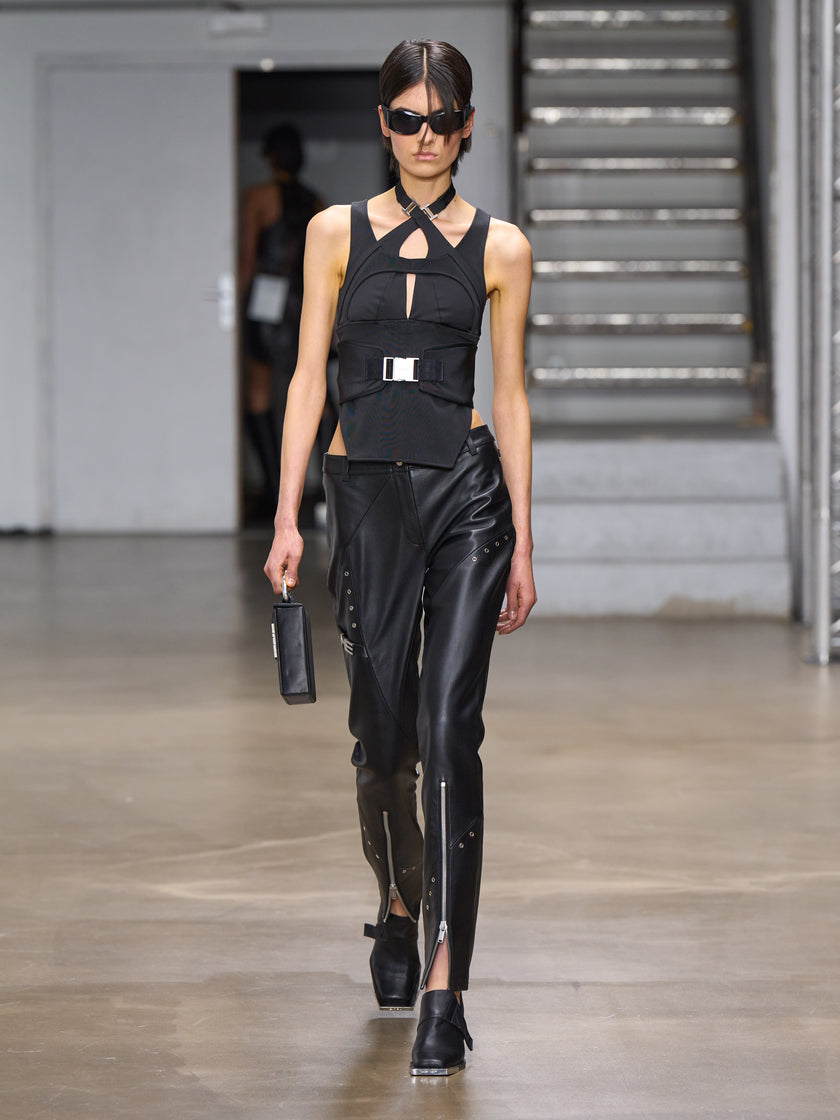 HE, product: UNIFIED LEATHER TROUSERS (Fig. 9)