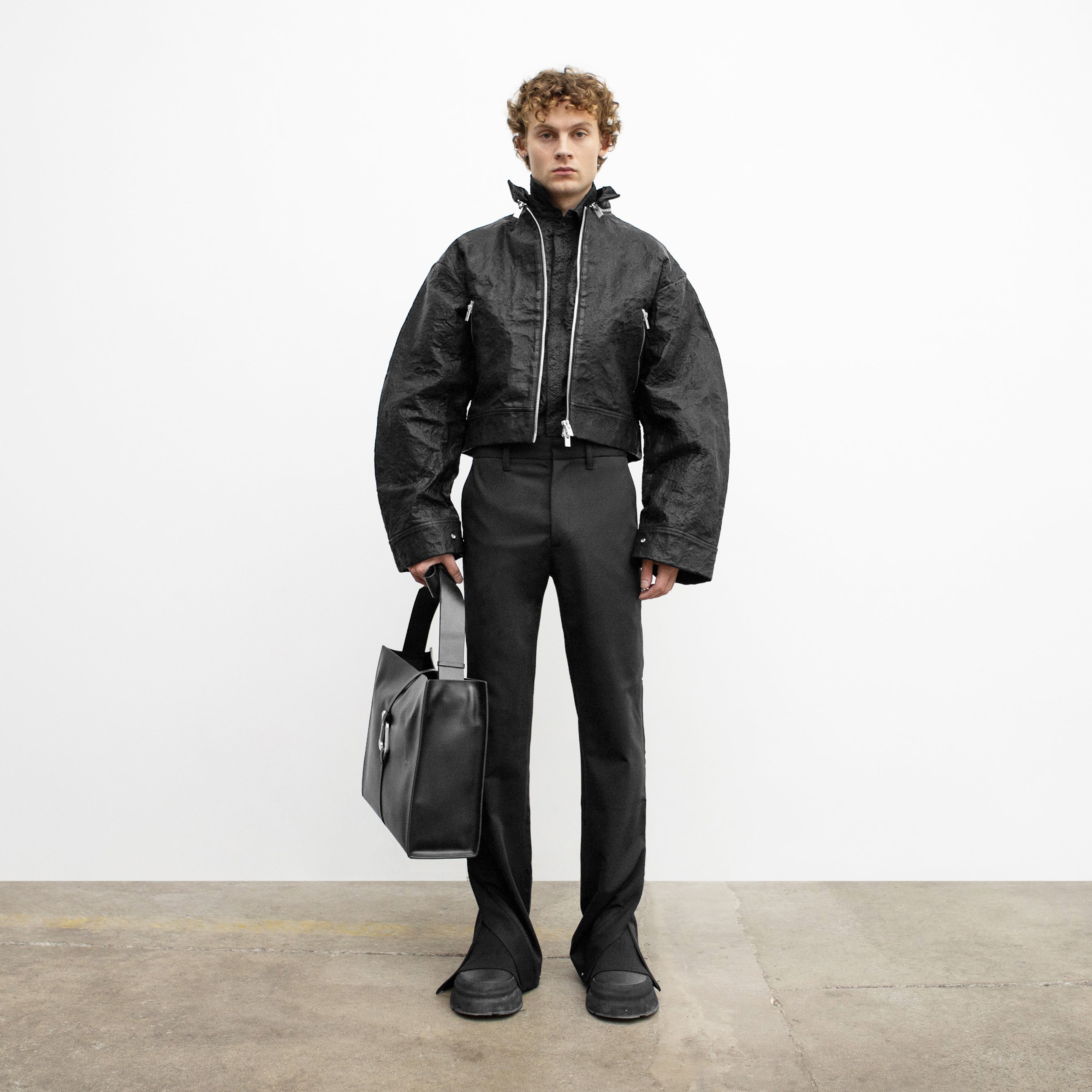 HE, product: STIFF LEATHER JACKET (Fig. 2)