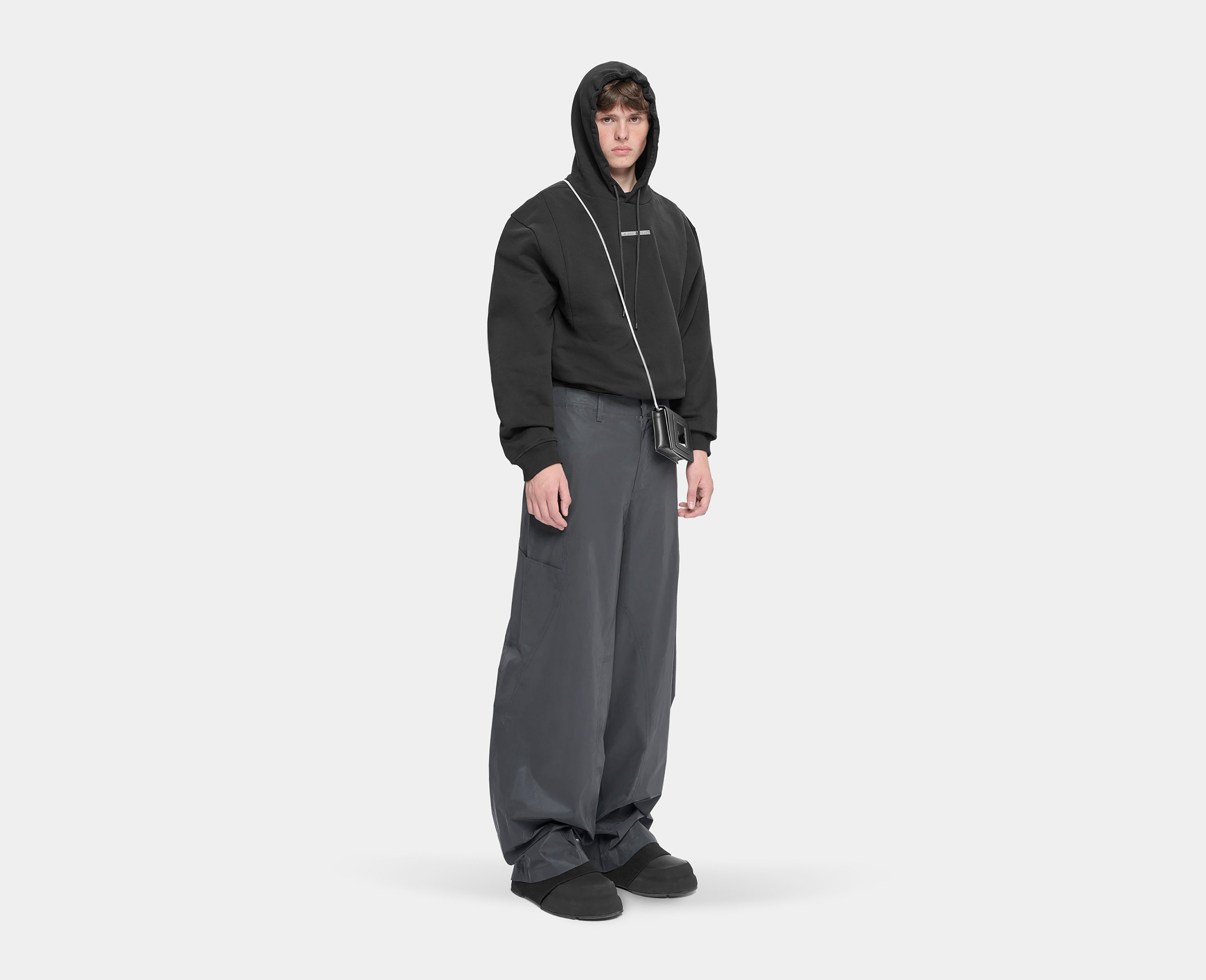 HE, product: INTERLUCENT TROUSERS (Fig. 3)