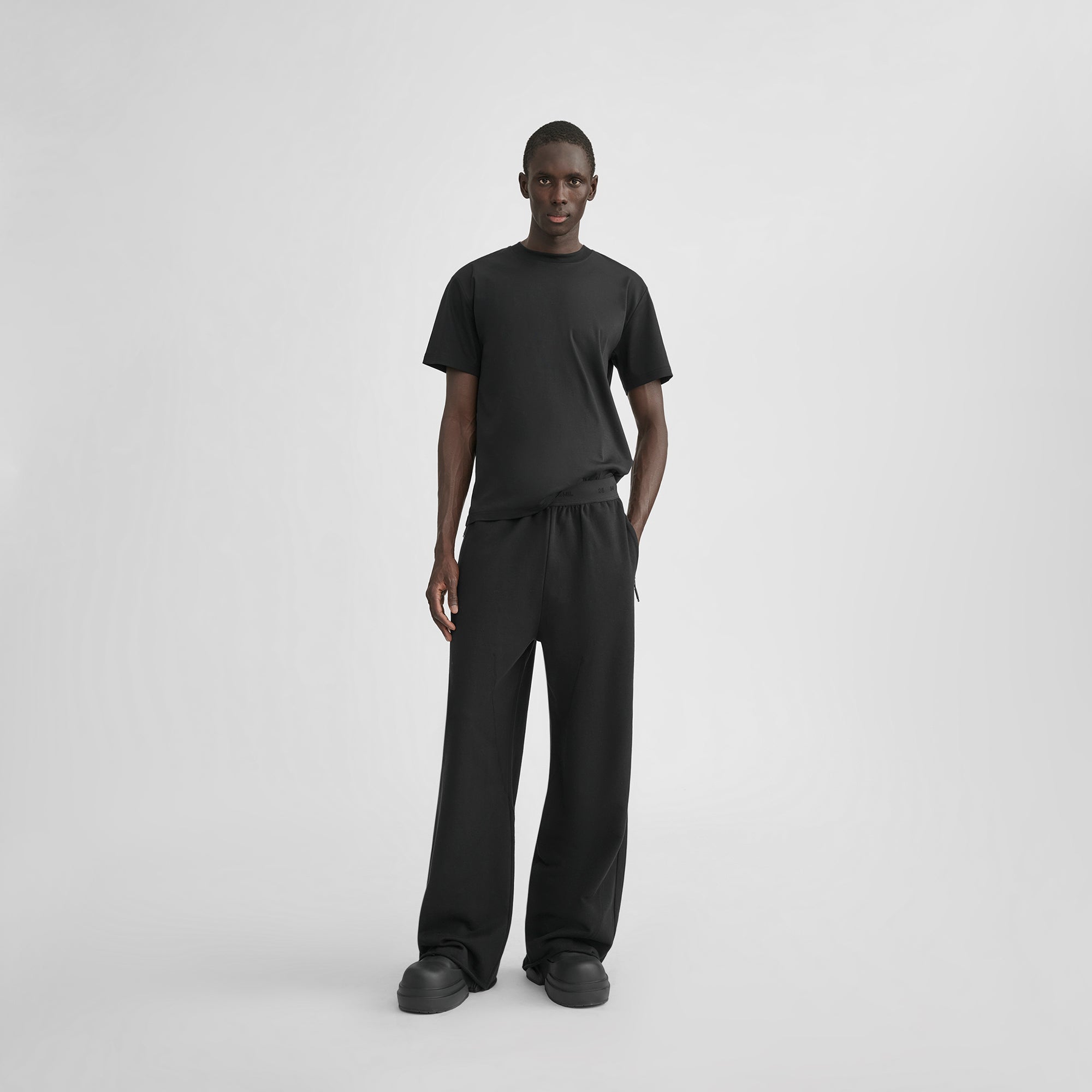 HE, product: UNIFORM SWEATPANTS (Fig. 3)