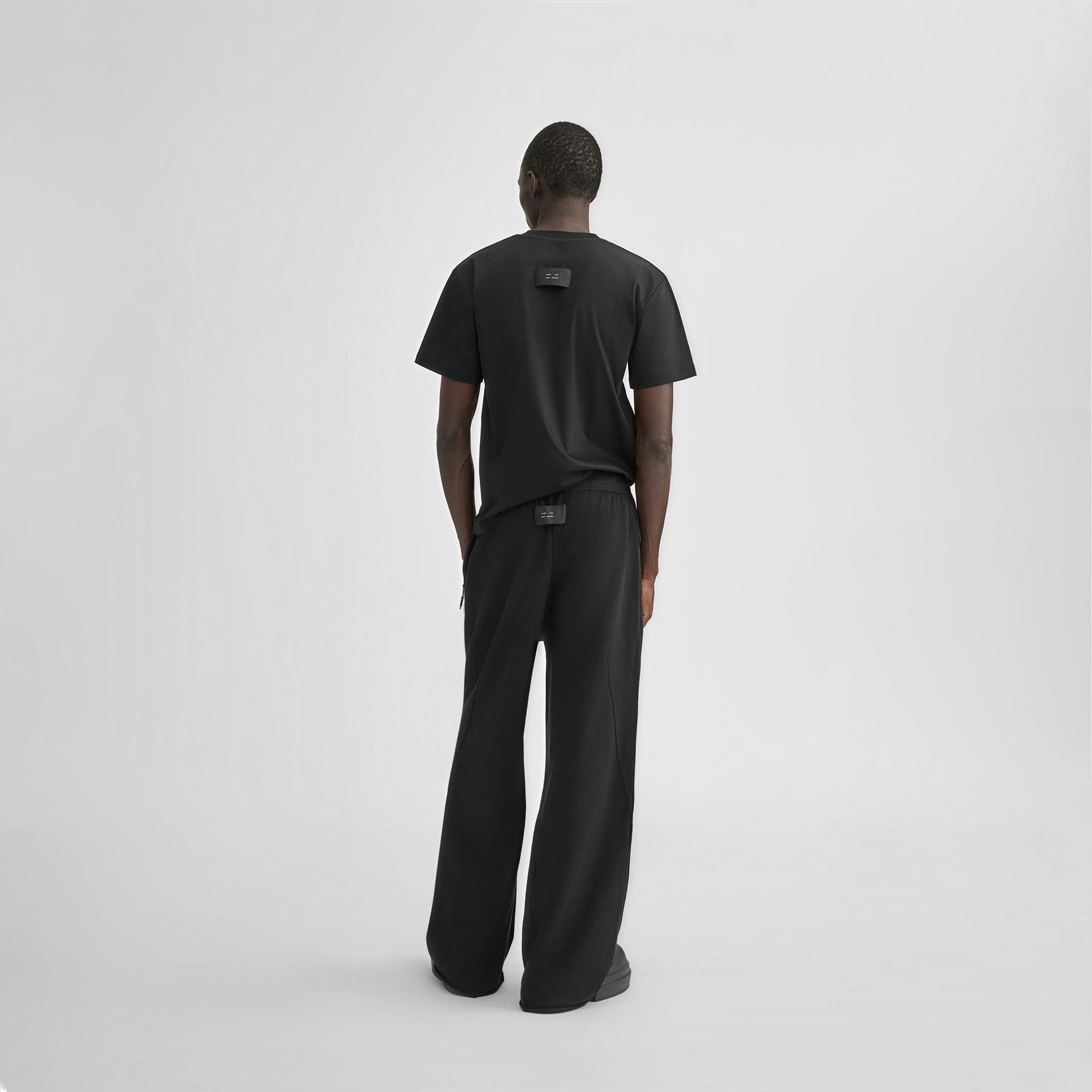 HE, product: UNIFORM SWEATPANTS (Fig. 5)