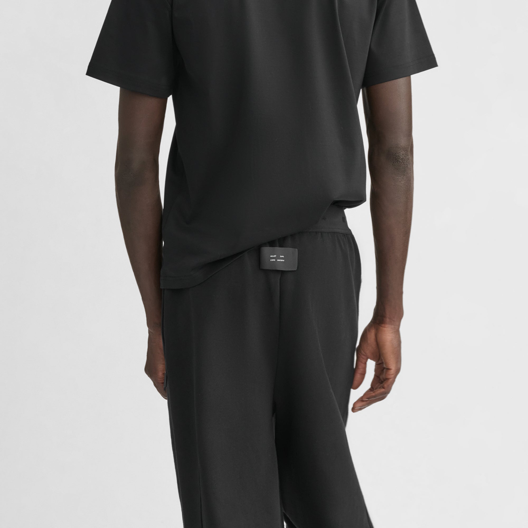 HE, product: UNIFORM SWEATPANTS (Fig. 6)