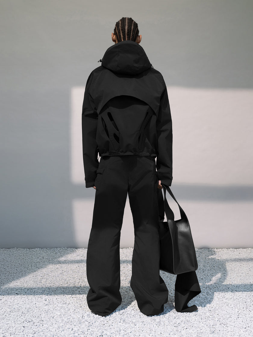 HE, product: TACK TROUSERS (Fig. 12)