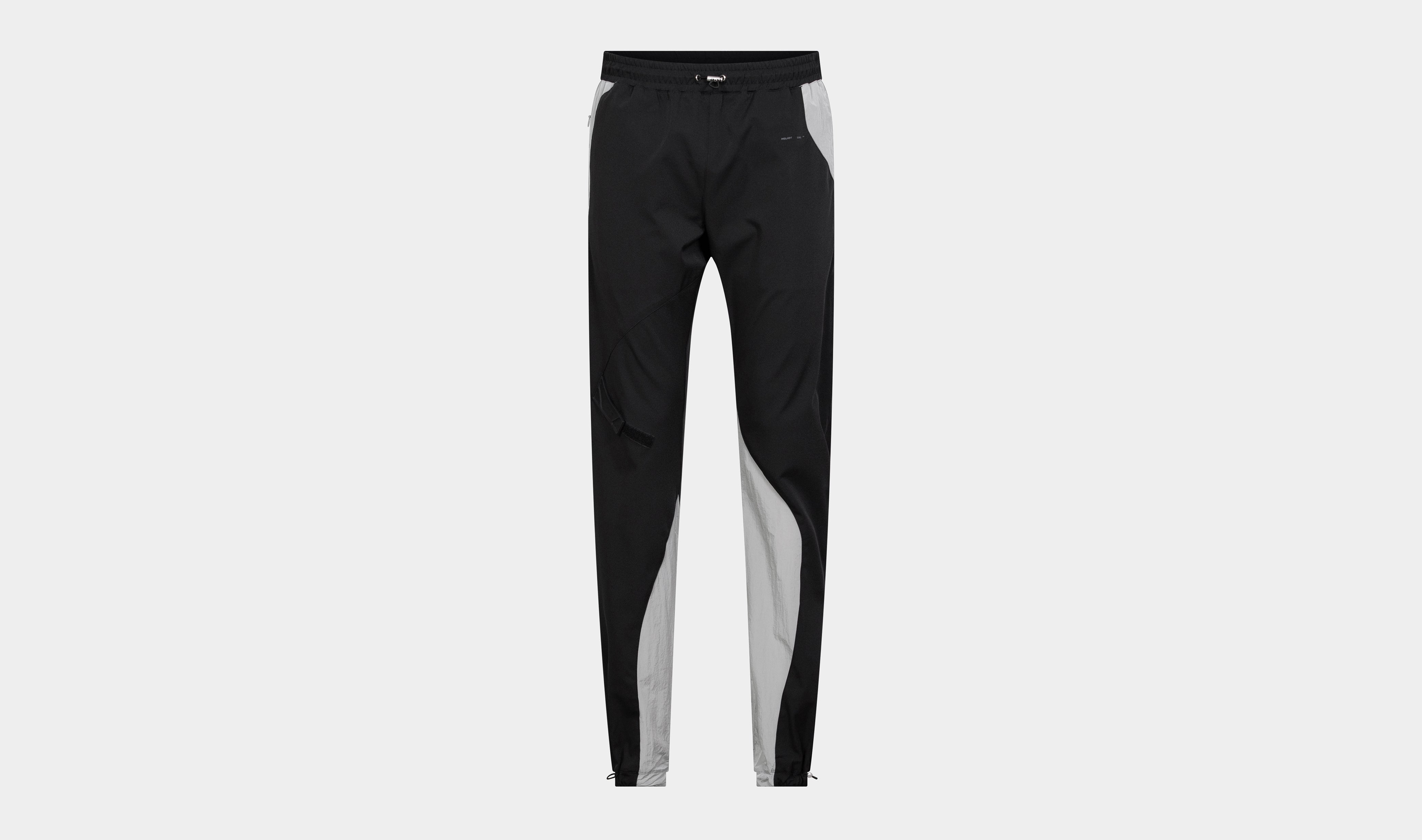 HE, product: RUBBER STRAP TRACK PANTS (Fig. 1)