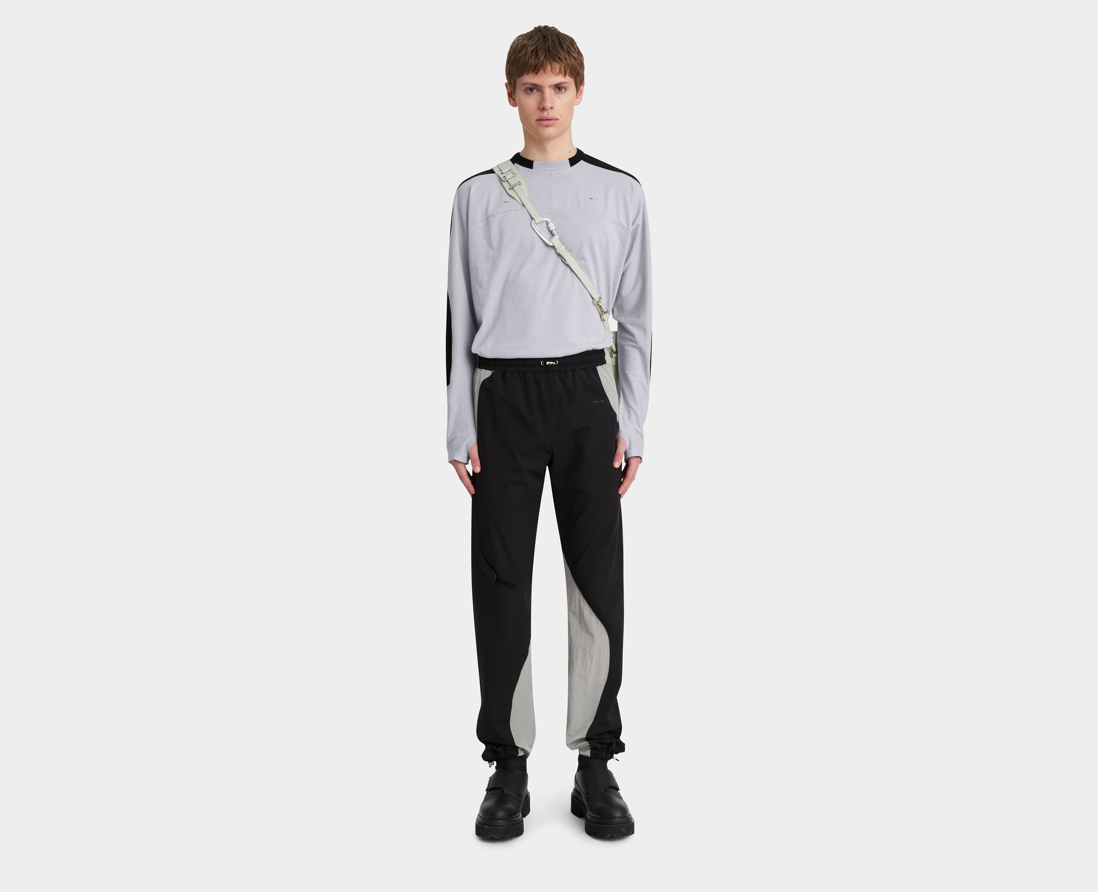 HE, product: RUBBER STRAP TRACK PANTS (Fig. 2)